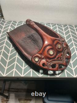 Maori wood-carved canoe bailer from New Zealand