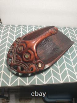 Maori wood-carved canoe bailer from New Zealand