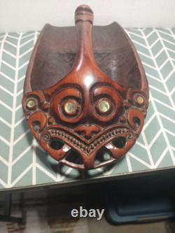 Maori wood-carved canoe bailer from New Zealand