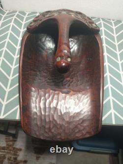Maori wood-carved canoe bailer from New Zealand