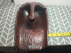 Maori wood-carved canoe bailer from New Zealand
