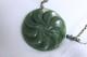 New Zealand Nephrite Jade Disk Pendant with Swirl Patterns by Maka, 6.4cm