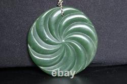 New Zealand Nephrite Jade Disk Pendant with Swirl Patterns by Maka, 6.4cm