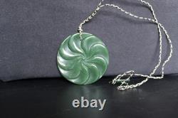 New Zealand Nephrite Jade Disk Pendant with Swirl Patterns by Maka, 6.4cm