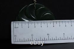 New Zealand Nephrite Jade Disk Pendant with Swirl Patterns by Maka, 6.4cm