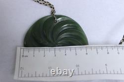 New Zealand Nephrite Jade Disk Pendant with Swirl Patterns by Maka, 6.4cm