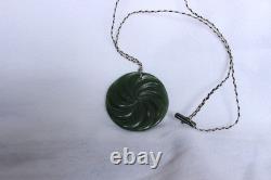 New Zealand Nephrite Jade Disk Pendant with Swirl Patterns by Maka, 6.4cm