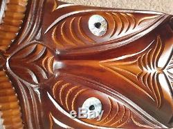 Vintage carved wood, traditional mask from New Zealand paua shell eyes